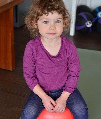 toddler on exercise ball